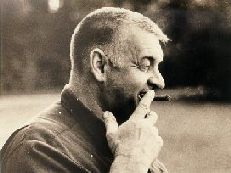 A classic photograph of Loren with a cigar
